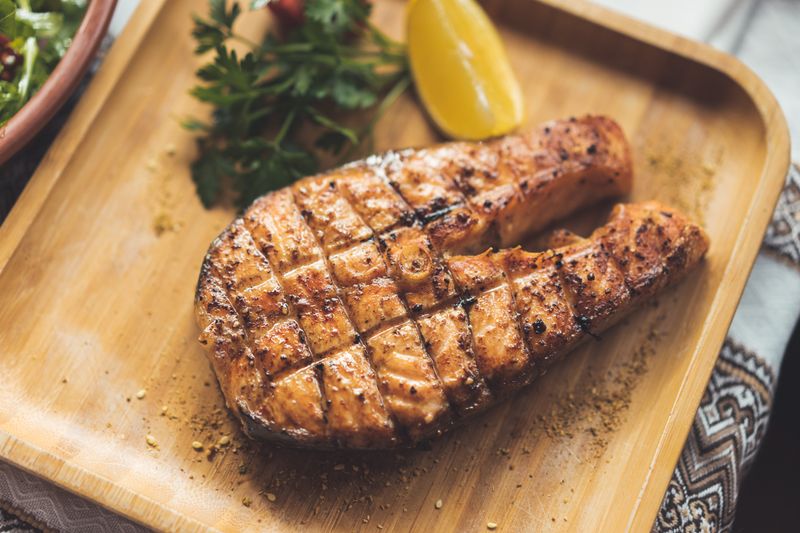 Grilled Atlantic salmon with lemon caper butter sauce