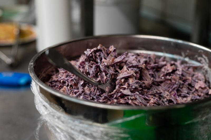 Slow-smoked pulled pork sandwich with coleslaw