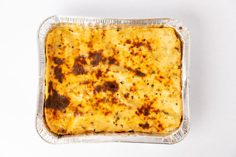 Creamy house-made mac and cheese with breadcrumb crust